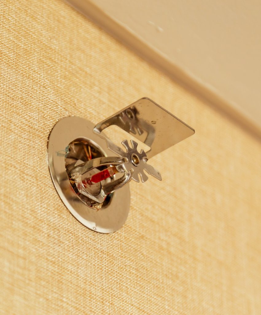 Fire sprinkler on a wall, fire emergency